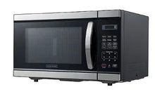Black + Decker microwave oven with keypad and digital display panel