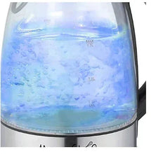 MegaChef glass tea kettle with water level markings on clear blue-tinted tank