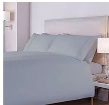 Full-size sheet set in harbor mist blue-gray with neatly spread flat sheet