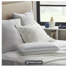 Memory foam bed pillow with white cover and blue edge piping