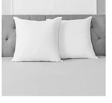 Two white euro-size pillows with smooth covers