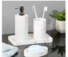 Marble-pattern bath accessory set on tray: lotion dispenser, toothbrush holder, soap dish, cup