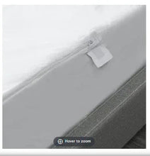 Zippered allergy mattress protector with corner label, light gray fabric
