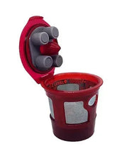 Red refillable brewing pod with gray seal inserts and open filter basket