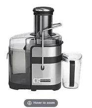Stainless steel juice extractor with clear pulp chamber and included cup