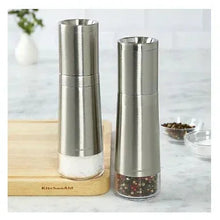 Stainless steel KitchenAid grinder with clear lower container for seasoning