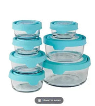 Glass food storage containers with teal snap lids, clear containers set