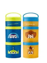 Two character-themed snack containers, Woody and Buzz Lightyear, lidded cylinders
