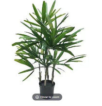 Artificial potted Rhapis palm plant in dark gray pot, green fronds
