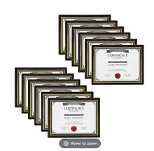 Stack of black certificate document frames with certificates displayed