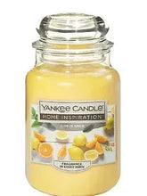 Yankee Candle citrus spice jar candle with yellow wax and clear lid