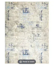 5x7 area rug with cream base and blue abstract distressed pattern
