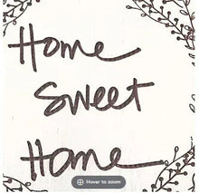 Close-up anti-fatigue kitchen mat text: black “Home sweet home” with wreath branches