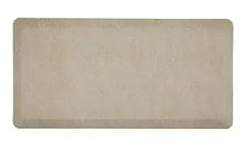 Rectangular textured kitchen mat with rounded corners, light tan