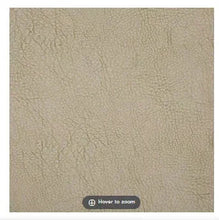 Textured kitchen mat in light tan, pebble-like surface