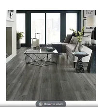 Vinyl plank flooring in dark oak with long planks and realistic wood grain