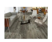 Rustic oak vinyl plank flooring with plank-grain pattern, in medium brown-gray.