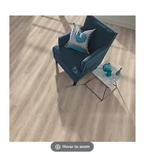 Light wood-look vinyl plank flooring with light tan plank pattern