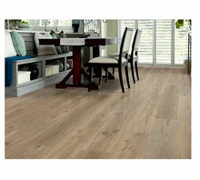 Vinyl plank flooring showing light wood-look boards running across the room