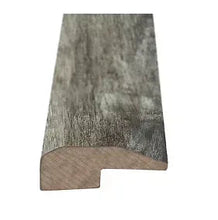 Rustic oak wood threshold with rounded notch and angled end, gray