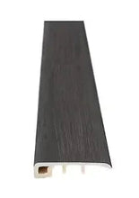 Dark oak baby threshold trim with light profile edge and grooved underside