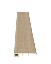 Light beige weathered baby threshold trim with channel edge and cutout profile