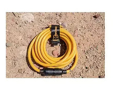 Yellow power cord with L14-30P plug coiled on concrete