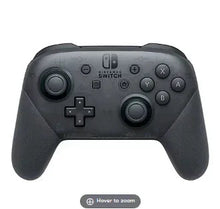Nintendo Switch Pro Controller, dark gray gamepad with analog sticks and button layout