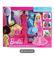 Fashion designer playset in pink box with dress designs and accessories
