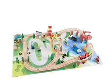 Wooden train set with curved tracks and colorful playmat, trains and vehicles