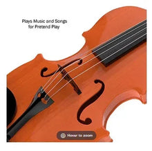 Kids electronic violin close-up, orange body with strings and pickup near bridge