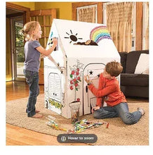 Cardboard playhouse clubhouse with rainbow sun design, front panels, children playing