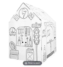 Cardboard garage playhouse side panel with wrench, tire, and tool illustrations