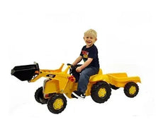 Yellow kids toy tractor with loader bucket and trailer, with child seated