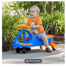Blue and orange kids’ wiggle ride-on car with orange wheels, child seated.