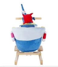 Rocking boat ride-on toy with blue body, wooden rockers, and plush sailor figure
