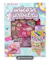 Friendship jewelry set box with unicorn-themed charms, bracelets, and colorful beads