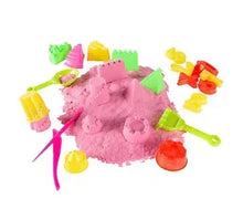 Pink moldable kinetic clay with multicolor molds and accessories, including tools and cutters