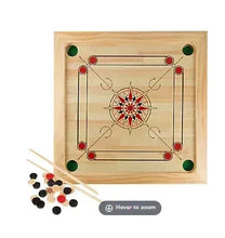 Wooden carrom board game with star center, red pockets, and black and colored pieces