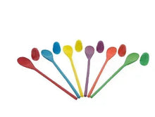 Colorful wooden spoons for an egg and spoon race game