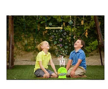 Gazillion Rollin' Wave bubble machine spraying bubbles outdoors