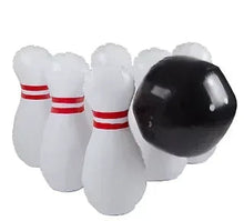 Giant bowling game set: black ball with white bowling pins lined up