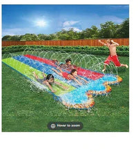 Kids triple racer water slide with three lanes, splash pads, and water play
