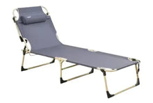 Folding reclining lounge chair with gray padded headrest and fabric seat, folded legs
