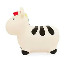 Inflatable zebra ride-on bouncer with black stripes and red nose
