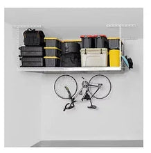 Overhead storage rack on white wall with bins and containers on shelf