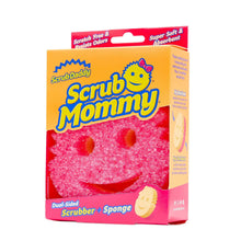 Scrub Mommy dual-sided cleaning sponge in retail package, pink smiling face design