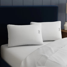 Two white down-alternative pillows with stitched edges and logo