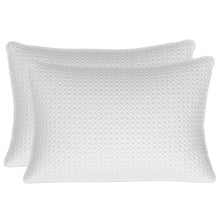 Pair of white quilted rectangular pillows with diamond pattern