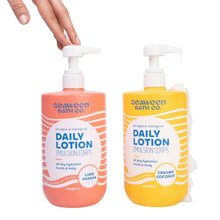 Seaweed Bath Co. Daily Lotion pump bottles held by hands, lime papaya and creamy coconut